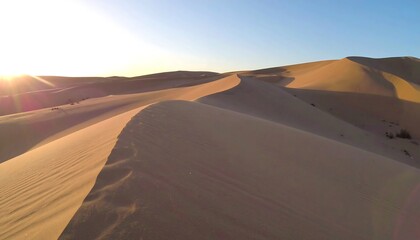 Desert dunes at sunrise