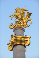 Obraz premium St. George Statue or Freedom Monument at Freedom square in Tbilisi, Georgia