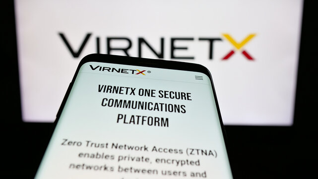 Stuttgart, Germany - 08-18-2025: Mobile phone with website of US Internet security company VirnetX Inc. on screen in front of logo. Focus on top-left of phone display.