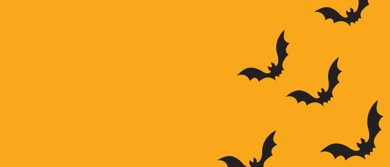 Flying Bats on an Orange Halloween Background Banner