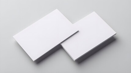 Clean blank business cards mockup on gray background for modern branding and design projects