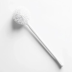 A simple and clean white toilet brush with a minimal design shot against an isolated white background  This household cleaning tool represents the concept of cleanliness hygiene