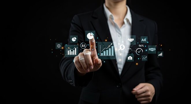 Businesswoman interacting with digital business graphs over black background