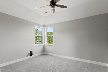 Bright living room interior in modern apartment with large windows
Clean white kitchen with stainless appliances in contemporary condo