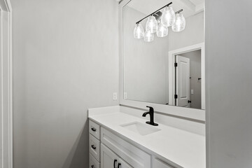 Bright living room interior in modern apartment with large windows
Clean white kitchen with stainless appliances in contemporary condo