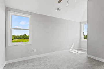 Bright living room interior in modern apartment with large windows
Clean white kitchen with stainless appliances in contemporary condo