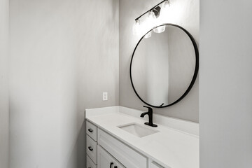 Bright living room interior in modern apartment with large windows
Clean white kitchen with stainless appliances in contemporary condo