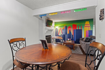 modern dining room. rental. hardwood floors, mural on wall, staged © samiam2007