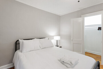 Bright living room interior in modern apartment with large windows
Clean white kitchen with stainless appliances in contemporary condo