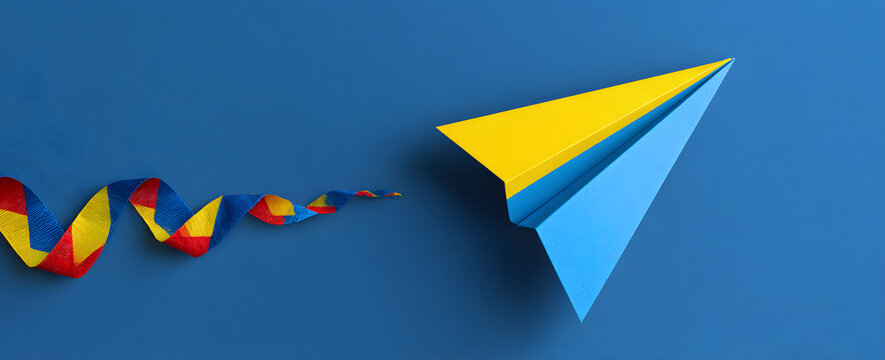 Autism awareness. paper plane in origami style with autism awareness ribbon on blue background.
