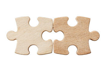 Fototapeta premium Two light beige wooden puzzle pieces joined