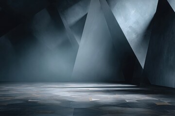 Obraz premium Empty dark stone pedestal with spotlight in moody studio setting, ideal for product display, branding, or minimalist design themes.
