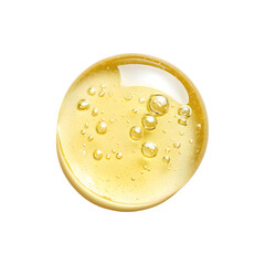 Close-up of a light yellow drop of round, textured serum
