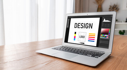 Fototapeta premium Graphic designer software for modern design of web page and commercial ads showing on the computer screen