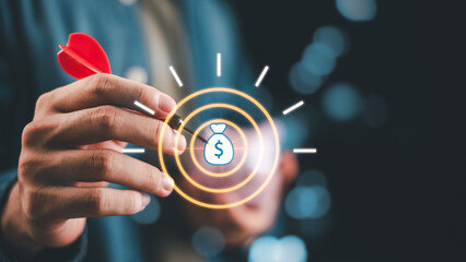 Financial goal setting ,dart hitting money target, symbolizing investment planning, profit strategy, savings objectives, and business growth, representing vision, focus, long-term financial success.