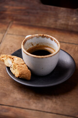 Cup of coffee on wooden background. Soft focus. Copy space	