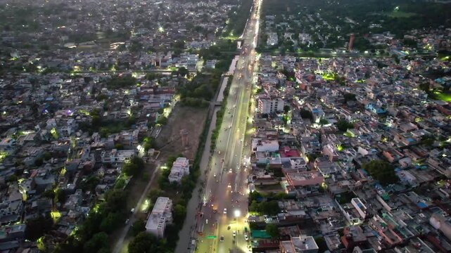 Aerial shot of a densely populated city with cars moving in streets in lucknow a city in inda