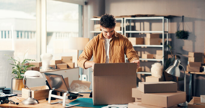 Box, packing and supply chain with man in office for small business delivery or distribution. Ecommerce, package and shipping with startup employee in logistics workshop for commercial service