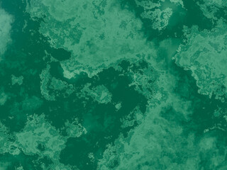 Detailed green marble texture with a blend of dark and light patterns.