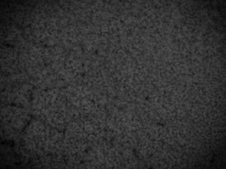 Solid black rock texture with a matte finish and intricate surface details, perfect for dark backgrounds.