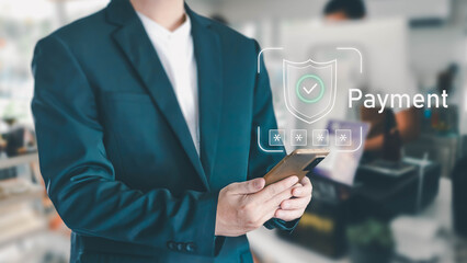Businessman in suit using smartphone for secure mobile payment with shield icon and password entry on interface. Concept of fintech, online transaction, and data protection.