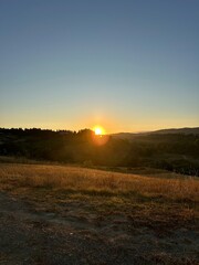 Tuscany landscape green hills sunrise