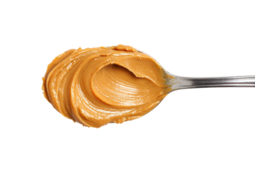 A spoonful of creamy peanut butter on transparent background
