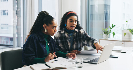 Laptop, documents and business women in office planning for finance report in collaboration. Computer, paperwork and financial advisors working on investment proposal with discussion in workplace. © peopleimages.com