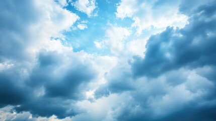 Fototapeta premium Dramatic blue sky with large fluffy white and dark clouds