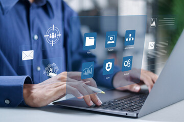 Content management system, Administration, statistics, user and configuration settings, create and publish articles. Businessman using laptop with web site management software CMS.