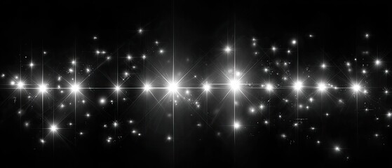 Obraz premium Sparkling light bursts on black background
