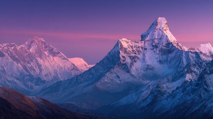 Fototapeta premium Majestic snow-capped peaks at dawn
