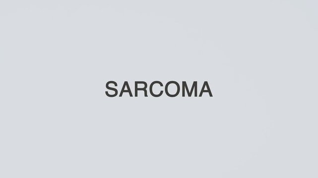 Sarcoma concept word hand holding stethoscope on white background for cancer monitoring, diagnosis, treatment, prevention, wellness, and musculoskeletal health awareness