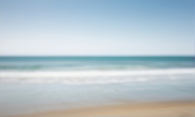 Soft Focus Beach Scene Calm Ocean Waves and Sandy Shore Under a Pale Blue Sky