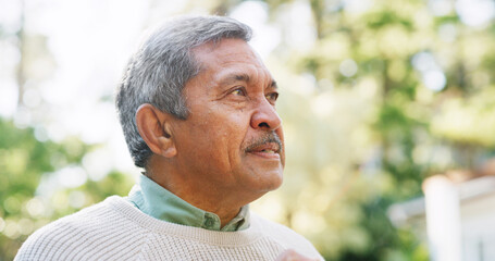 Thinking, garden and senior man in home for nostalgia, memory and thoughtful in retirement. Backyard, elderly and person with wondering, daydreaming and outdoor for reflection, wellness and fresh air