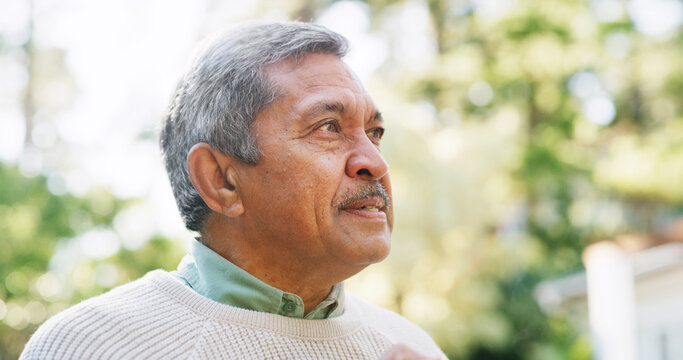 Thinking, garden and senior man in home for nostalgia, memory and thoughtful in retirement. Backyard, elderly and person with wondering, daydreaming and outdoor for reflection, wellness and fresh air - Powered by Adobe