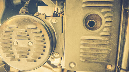 Diesel generator pulley and belt system close-up, focusing on alignment, tension control, and mechanical detail, perfect for industry, machinery, and engineering background visuals.