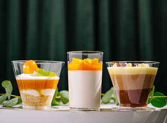 Delicious desserts displayed in elegant glasses at a cozy cafe