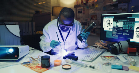 Investigation, forensic analysis and brush knife with uv light, dust and fingerprint evidence....