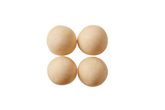 Four pale beige round candies arranged in a square
