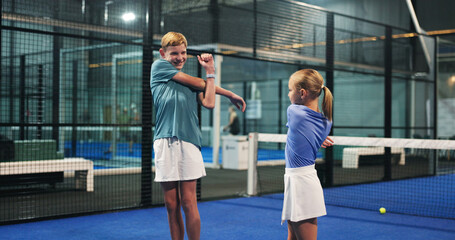 Fototapeta premium Tennis, fitness and children stretching on court for match warm up, practice routine and exercise. Padel, kid players and team with arm workout for sport performance, start training and getting ready