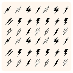 Hand-drawn simple lightning bolt doodles.