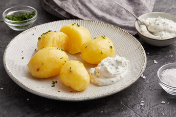Boiled potatoes with chive dip