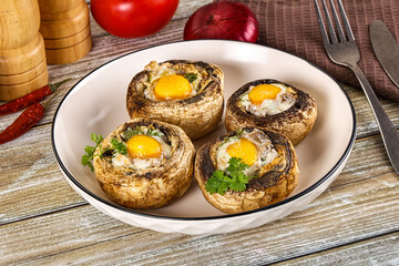 Baked champignon with quail egg