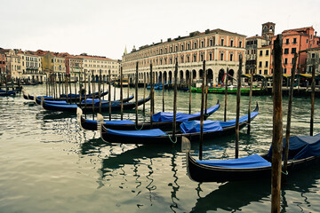 Gorgeous cityscape of Venice with narrow canals, boats and gondolas and bridges with traditional Colorful  buildings. Location: Venice, Veneto region, Italy, Europe