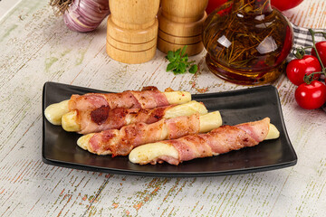 Hot mozzarella sticks with bacon