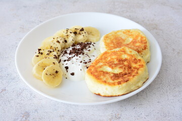 Breakfast Delight Cheese Pancakes with Banana and Cream and chocolate chips