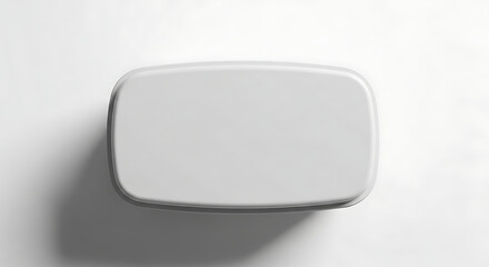 Obraz premium Mockup Top View of a Smooth White Rectangular Box with Rounded Corners and Soft Shadow