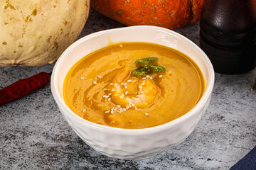 Pumpkin cream soup with prawns