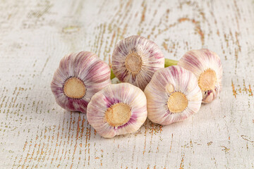 Raw young garlic bulb heap